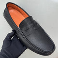 Hermès Men's Black Textured Penny Loafers